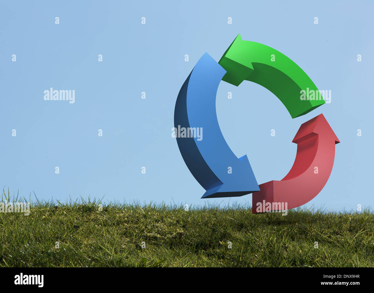 Blue red and green arrows in a field Stock Photo - Alamy