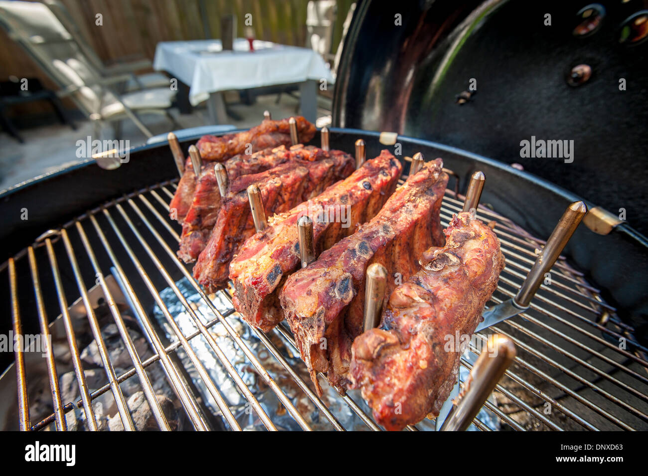 Spare ribs on a bbq Stock Photo - Alamy