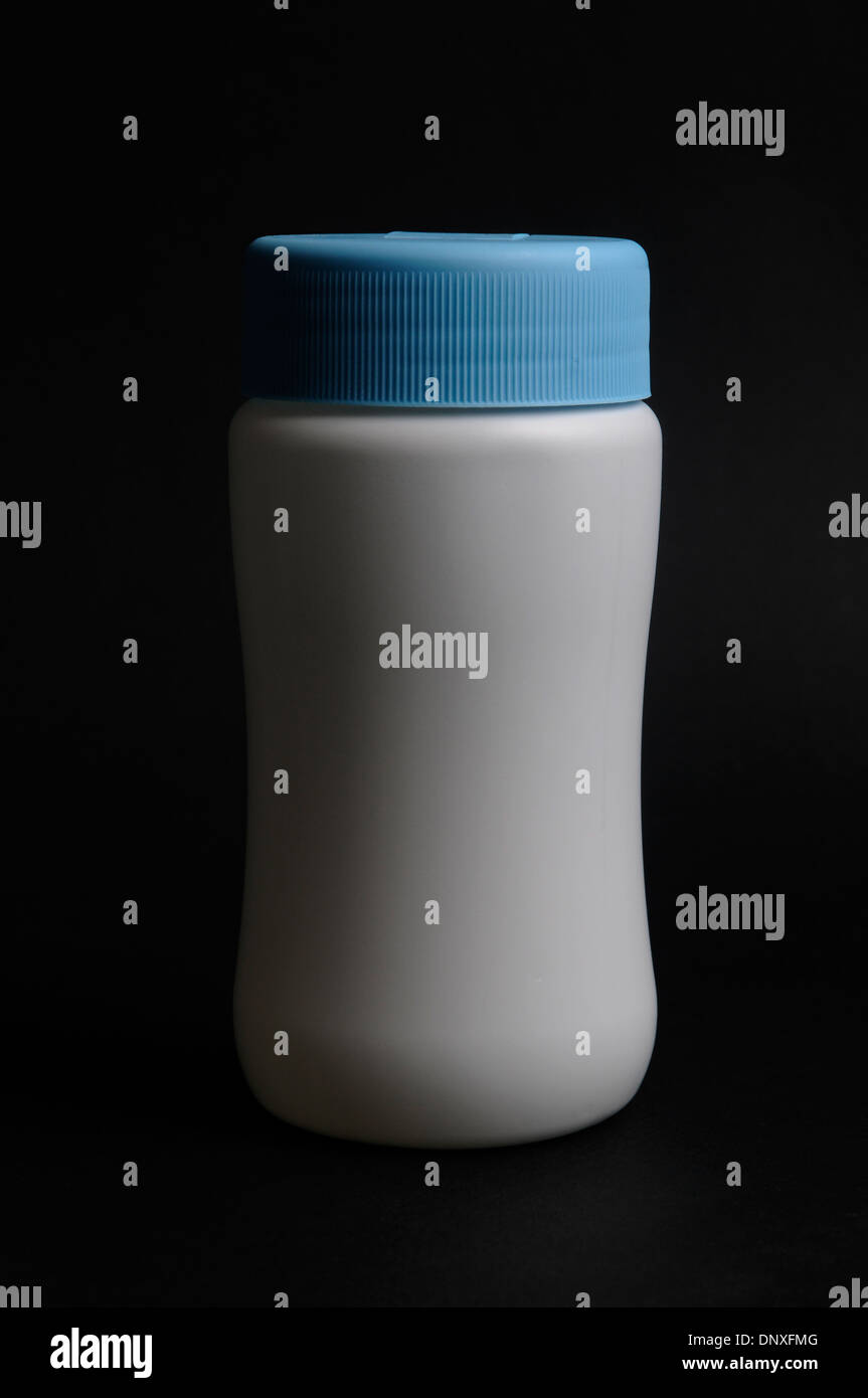 Clean cosmetic bottle on black Stock Photo Alamy