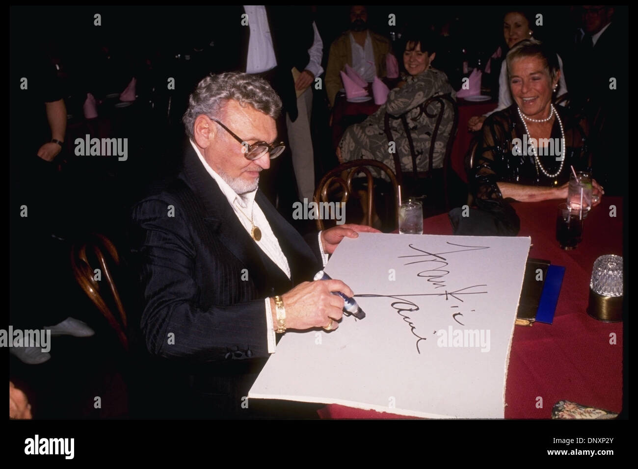 Hollywood, CA, USA;  FRANKIE LAINE signs autographs in an undated photo.  Mandatory Credit: Kathy Hutchins/ZUMA Press. (©) Kathy Hutchins Stock Photo