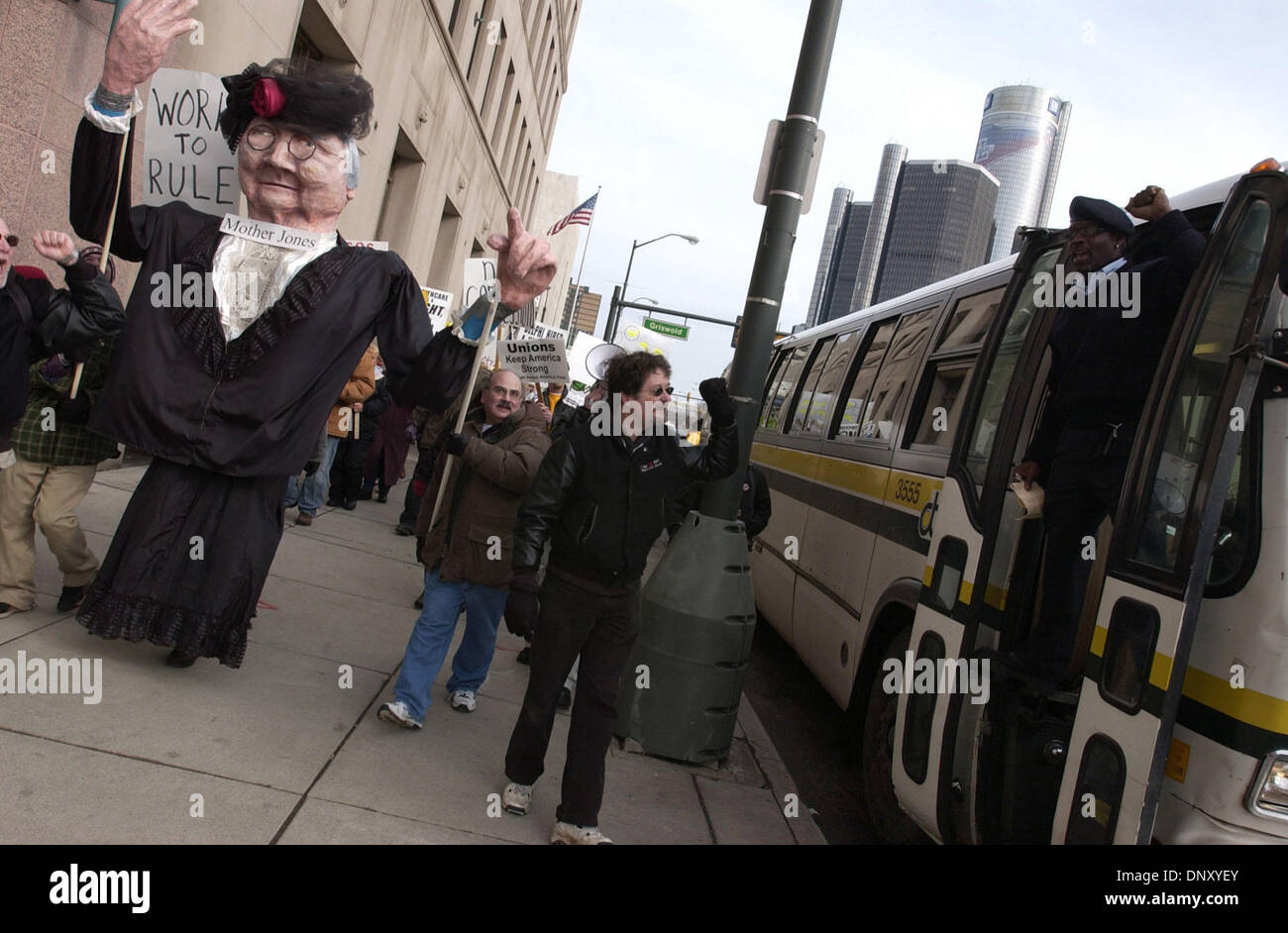 Jan 08, 2006; Detroit, Michigan, USA; A Detroit bus driver expresses support for passing protesting autoworkers in downtown Detroit where the North American International Auto Show is being held. The autoworkers, led by Soldiers of Solidarity, protested looming job and pensions cuts. Mandatory Credit: Photo by Mark Murrmann/ZUMA Press. (©) Copyright 2006 by Mark Murrmann Stock Photo