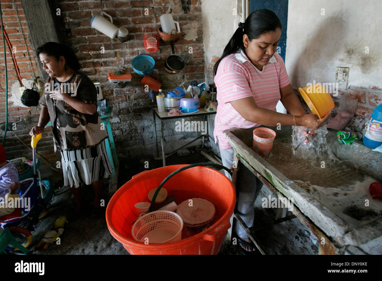 Jan 10, 2006; Axochiapan, MEXICO; The daily routine for Felix's wife ...