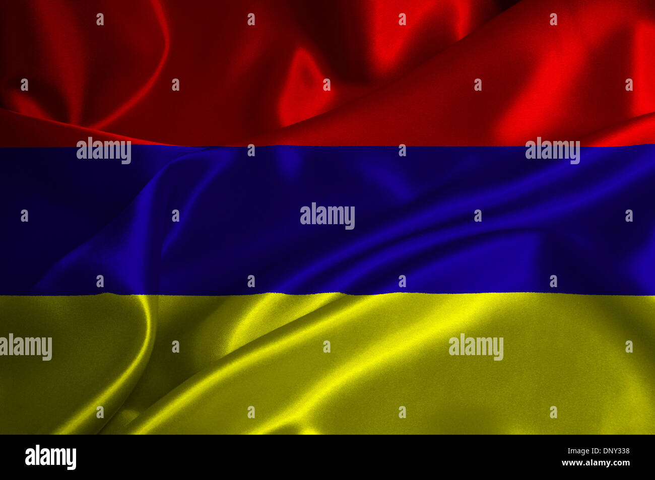 Armenia flag on satin texture. Stock Photo
