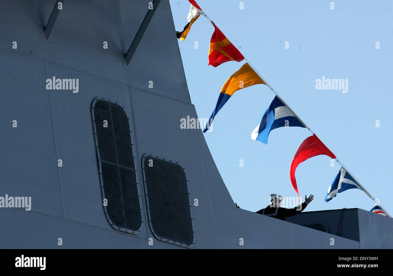 Jan 14, 2006; Ingleside, TX, USA; A crew member aboard the USS San Antonio signals to the crowd below him during the commissioning ceremony at Naval Station Ingleside in Ingleside. Mandatory Credit: Photo by Mike Kane/San Antonio Express-News/ZUMA Press. (©) Copyright 2006 by San Antonio Express-News Stock Photo