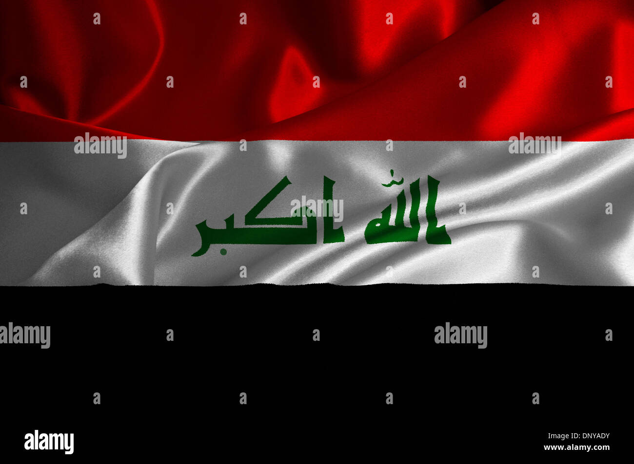 Iraq flag on satin texture. Stock Photo