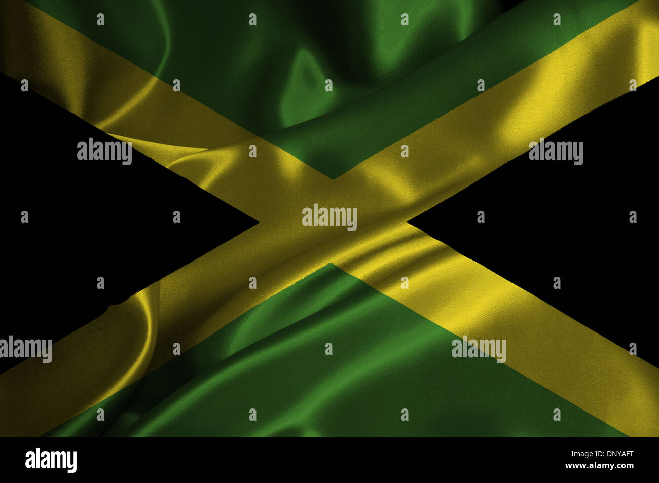 Jamaica flag on satin texture. Stock Photo