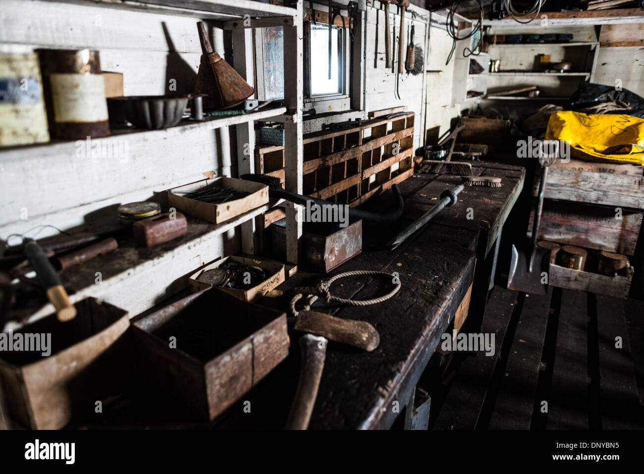 Wordie House Workbench Area Winter Island Antarctica // WINTER ISLAND, Antarctica — A workbench area at Wordie House. Originally established in 1947 as Base F by the Falkland Islands Dependencies Survey, the successor organization to Operation Tabarin, and later renamed after James Wordie, chief scientist and geologist on Ernest Shackleton's Endurance expedition, this research station is preserved near Vernadsky Research Base in the Argentine Islands. Stock Photo