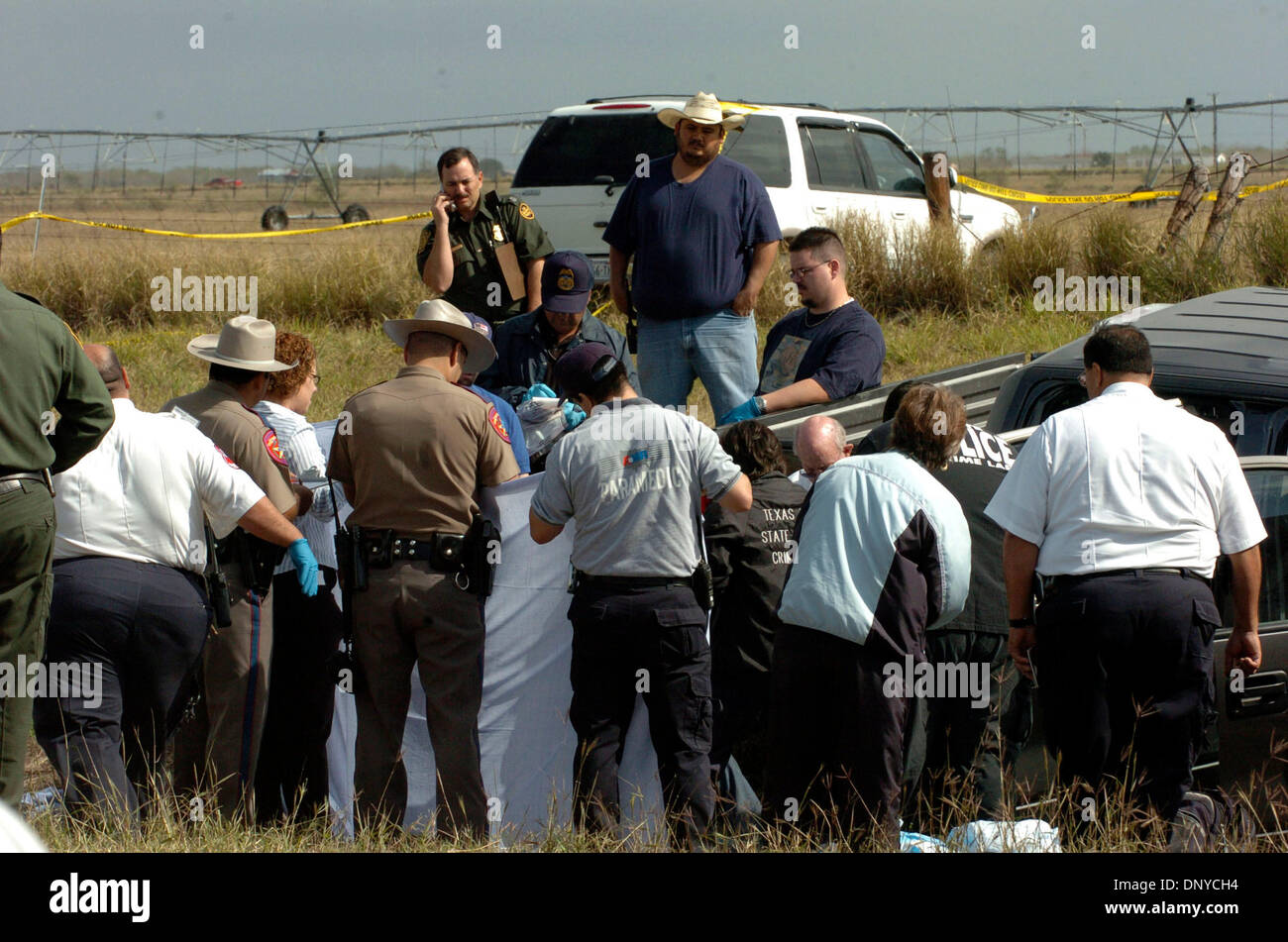 Jan 26, 2006; Falfurrias, TX, USA; DPS personel investigate the scene of a deadly accident