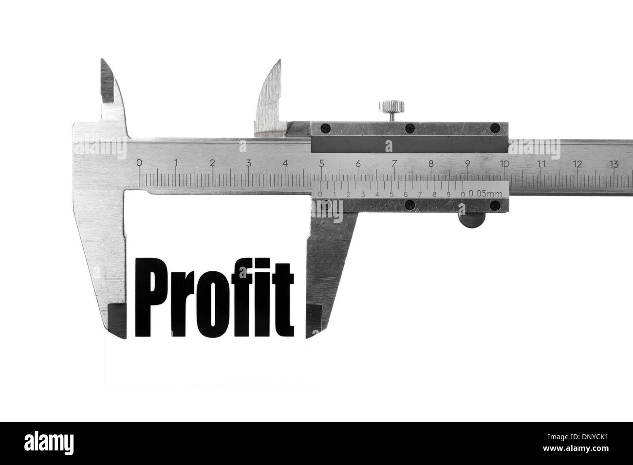 Close up shot of a caliper measuring the word 'Profit' Stock Photo