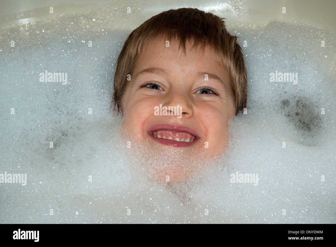 a small boy in a bubble bath Stock Photo Alamy