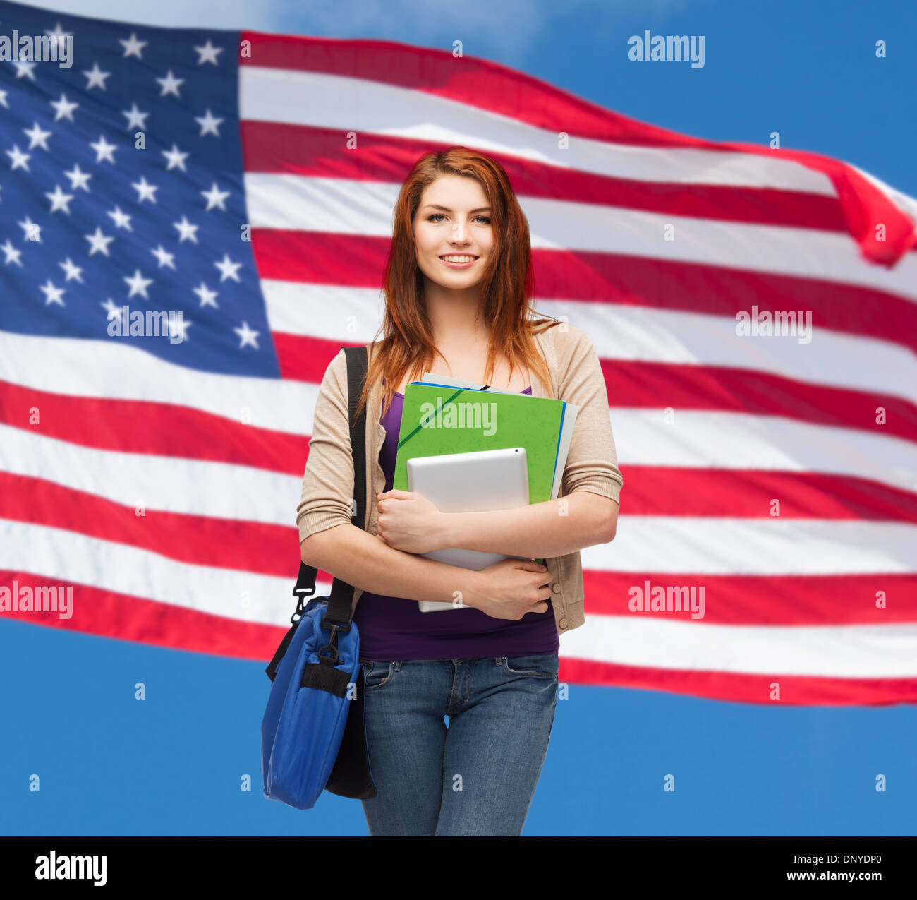 smiling student with bag, folders and tablet Stock Photo - Alamy