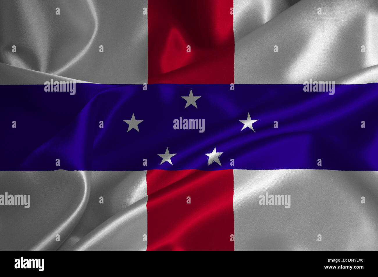 Netherlands Antilles flag on satin texture. Stock Photo