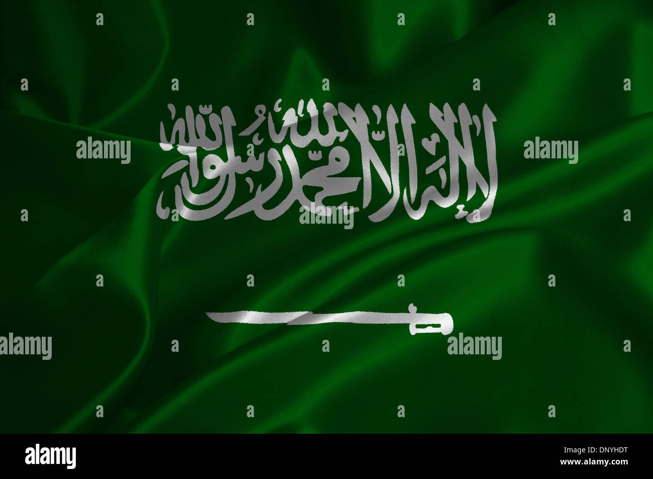 Saudi Arabia flag on satin texture. Stock Photo