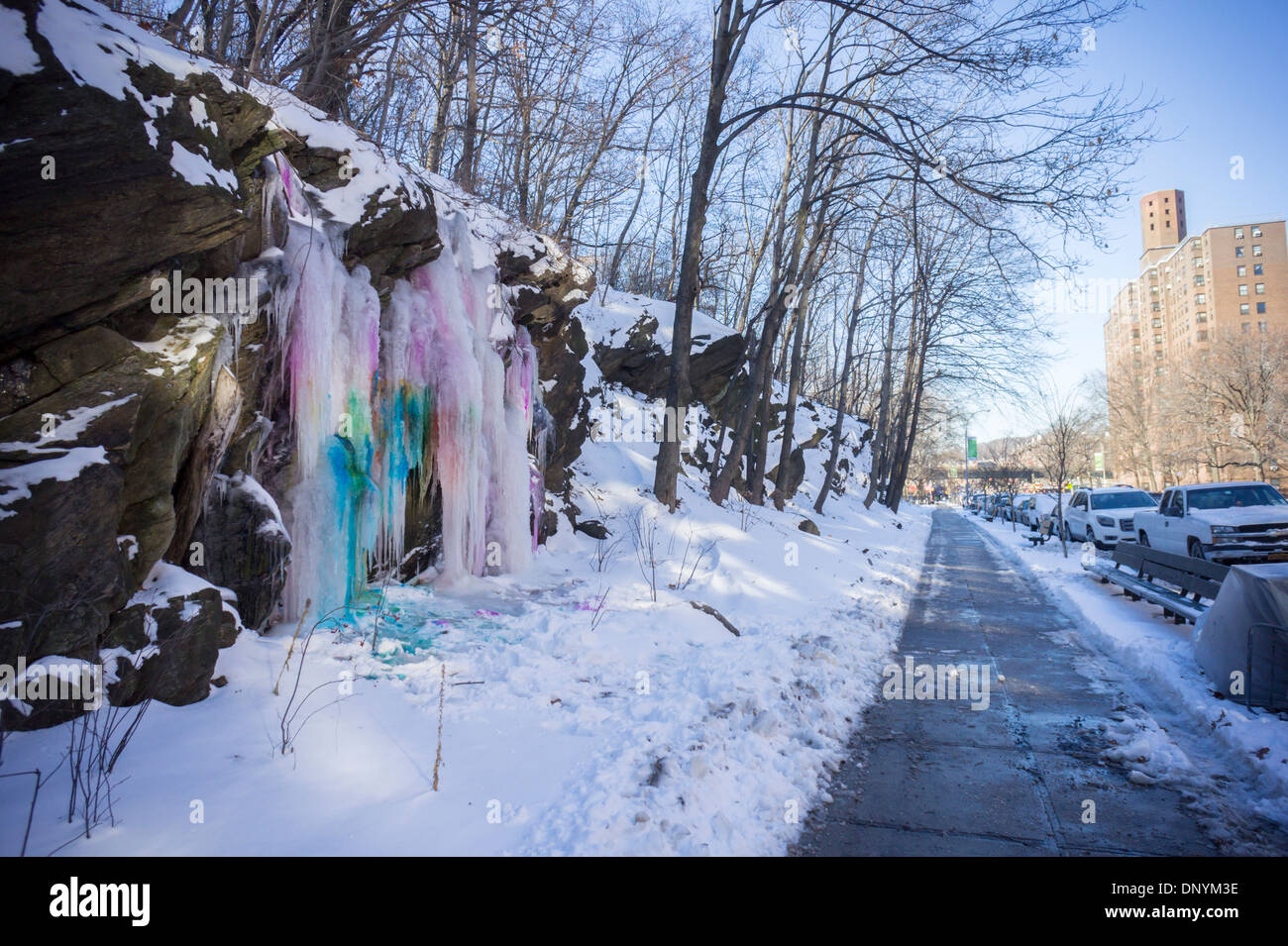 A waterfall comprised of colored icicles is seen on Dyckman Street in
