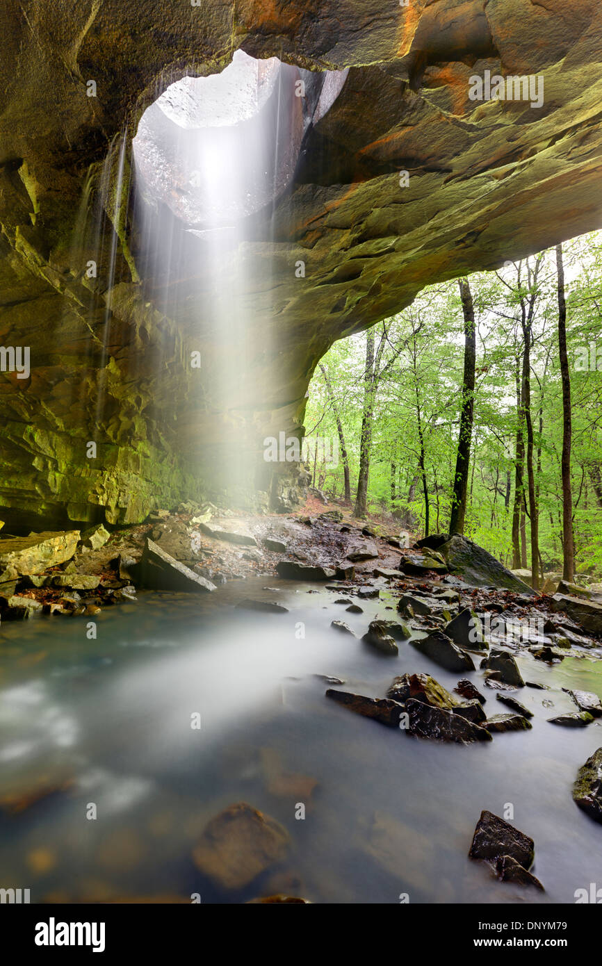 Time exposure of water falling through natural rock formation in central Arkansas. Stock Photo
