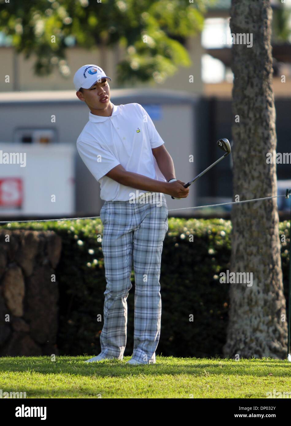 Honolulu, HI, USA. 5th Jan, 2014. January 5, 2014 - Chinese teen sensation Guan Tianlang during a practice day for the Sony Open at the Waialae Country Club in Honolulu, HI. Credit:  csm/Alamy Live News Stock Photo