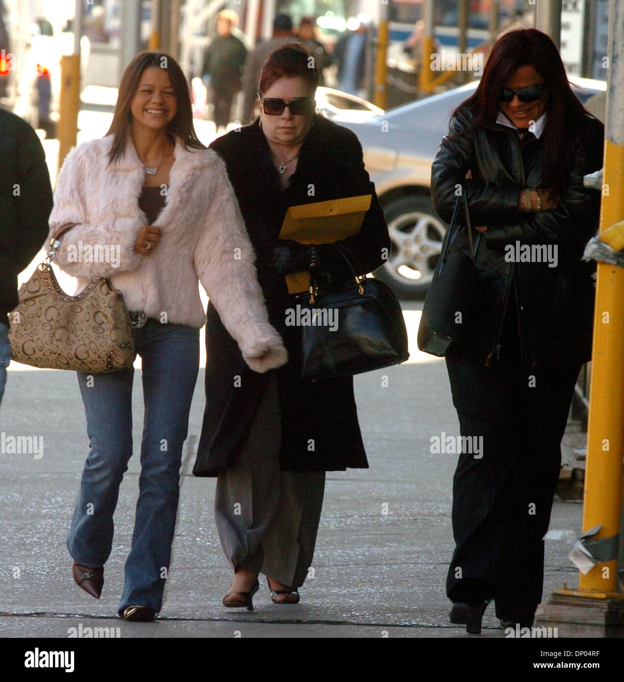 Mar 01, 2006; Manhattan, New York, USA; VICTORIA GOTTI (C), with her grandaughter VICTORIA GOTTI ALBANO (L), 18 and her daughter ANGEL (R) arrives for day eight of her son John Gotti Jr.'s retrial. Upon entering court Victoria referred to her grandaughter saying 'This is one of the grandaughters, not one of the illegitimate ones'. John Gotti Jr. is charged with racketeering and plo Stock Photo