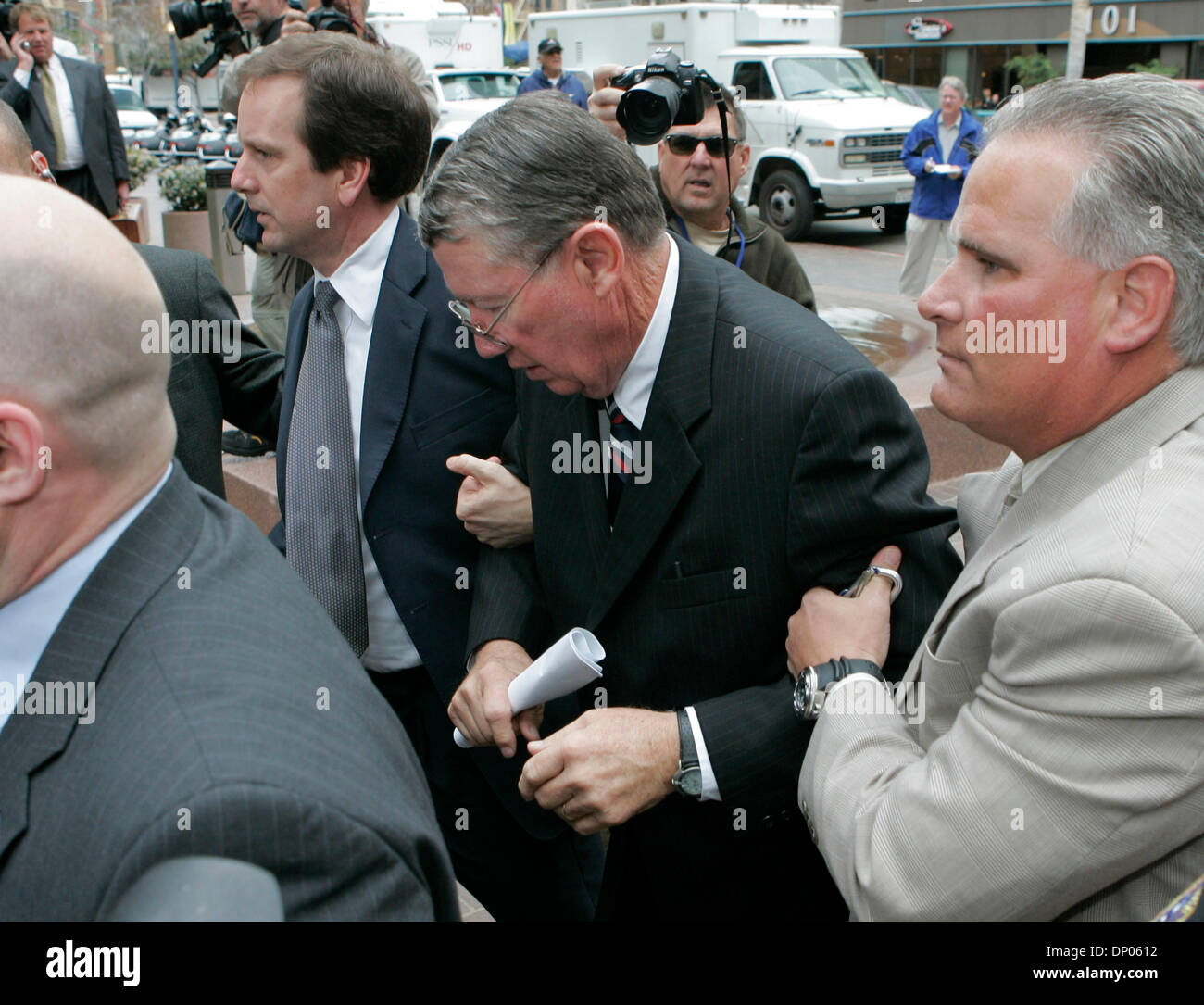 stang skive bh Mar 03, 2006; San Diego, CA, USA; Convicted congressman RANDY "DUKE"  CUNNINGHAM (R-50th) is escorted into the Federal Courthouse in San Diego,  California. CUNNINGHAM plead guilty to conspiracy and tax evasion for