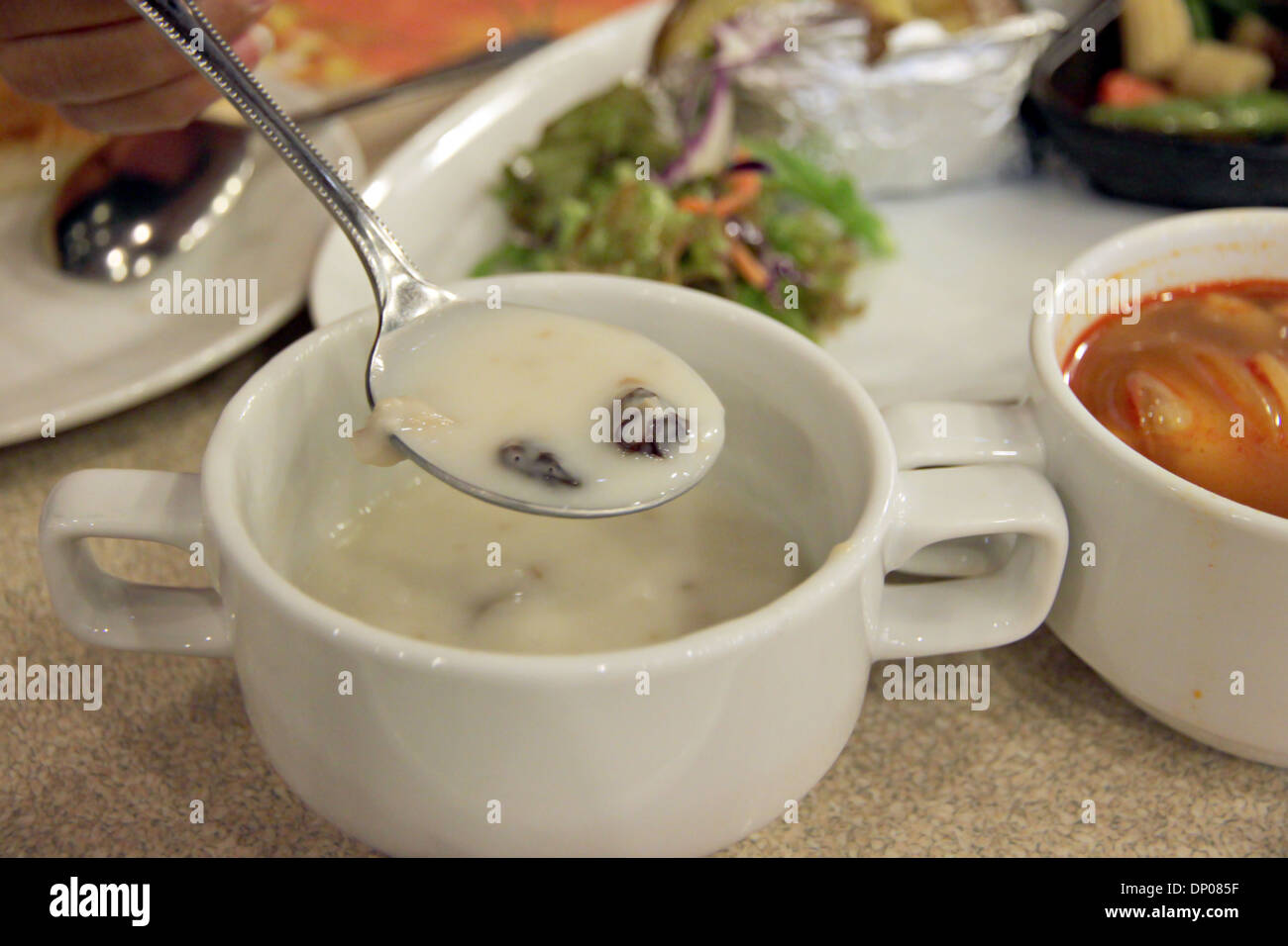 Mushroom cream soup with raisin. Stock Photo