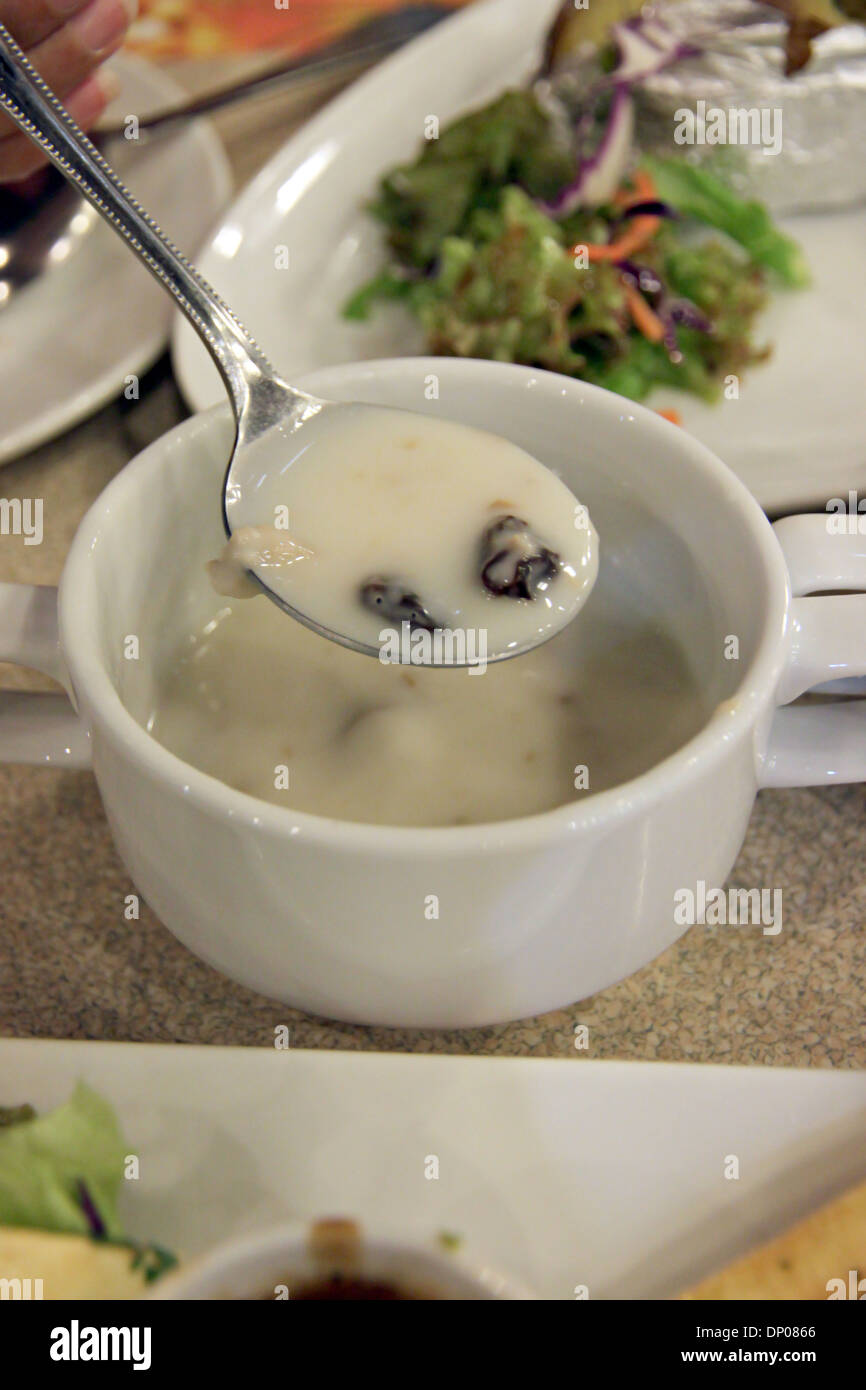 Mushroom cream soup with raisin. Stock Photo