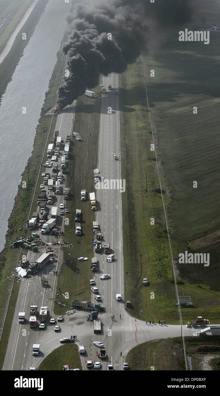 Mar 07, 2006; Palm Beach, FL, USA; A morning multi-vehicle accident on Highway 27 south of South Bay and eight miles north of the Palm Beach County and Broward County line, closed north and southbound traffice through noon. A tanker truck exploded, a fuel spill was reported, several other tractor trailers were involved. A man was extracted from his rig late in the morning by Palm B Stock Photo