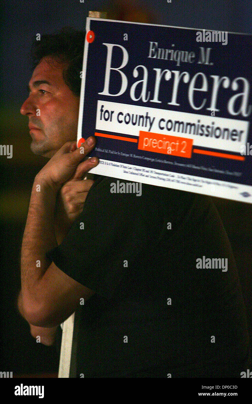 Mar 07, 2006; San Antonio, TX, USA; Texas Primary Elections 2006:  Robert Bernal holds a sign as he listens to County commissioner, Pct. 2 candidate Enrique Barrera give a concession speach Tuesday, March 7, 2006 at his campaign headquarters. Barrera lost his bid to incumbent Paul Elizondo. Mandatory Credit: Photo by BM Sobhani/San Antonio Express-News/ZUMA Press. (©) Copyright 200 Stock Photo