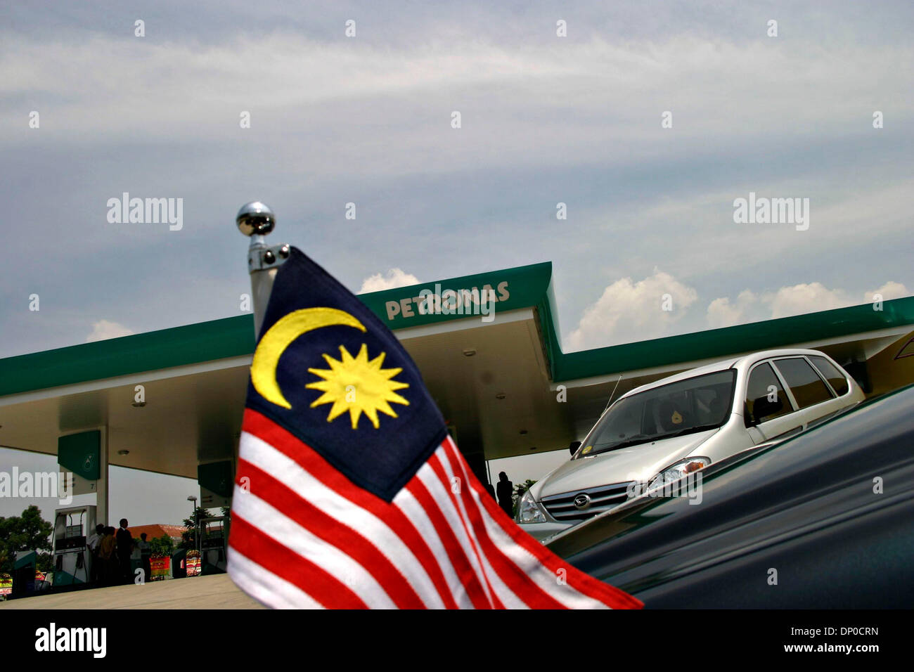 Mar 09, 2006; Cibubur, INDONESIA; Petronas, the national oil company of Malaysia opens its first petrol station in Indonesia at Cibubur, East Jakarta. Petronas is the second foreign petrol station who operates in Indonesia, after Shell. In one Petronas petrol station, they invests 10 billion IDR. Until year 2011, Petronas will reach target to build 200 petrol stations in all over I Stock Photo