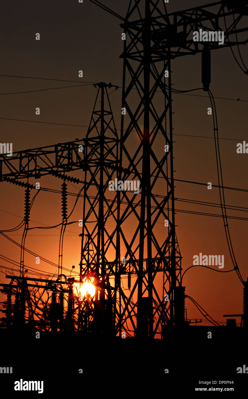 Sunset of powerhouse with Silhouette. Stock Photo