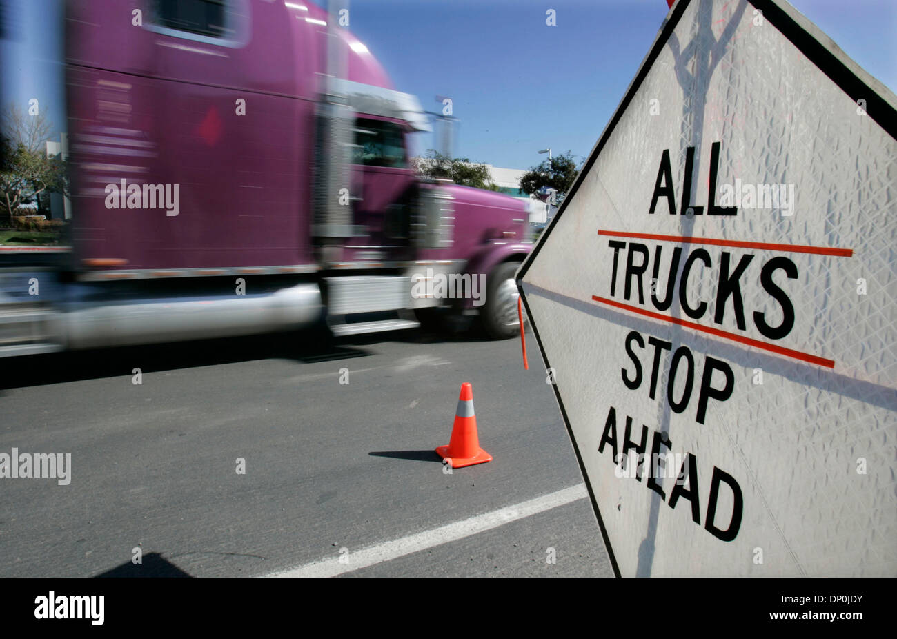 Mar 22, 2006; Otay Mesa, CA, USA; A truck heads for a California Air Resources Board and CHP inspection station on Sempre Viva Drive. Trucks on the road had their exhaust tested and those who failed the test were cited. Mandatory Credit: Photo by Howard Lipin/SDU-T/ZUMA Press. (©) Copyright 2006 by SDU-T Stock Photo