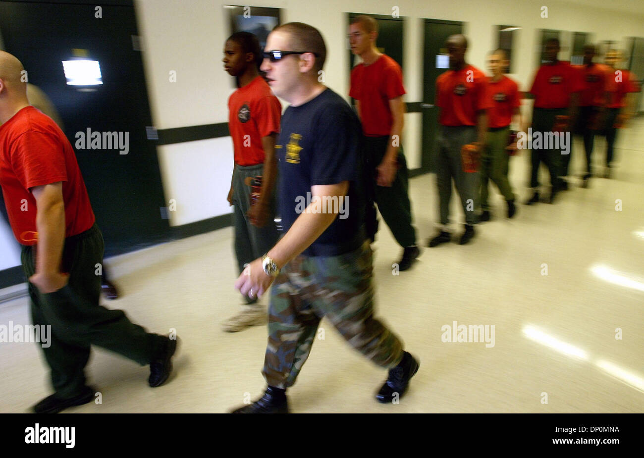 Mar 28, 2006; Stuart, FL, USA; Drill instructer George Yacobellis leads his cadets out of the dormitory to the obstacle course at the Martin County Sheriff's Office boot camp in Stuart.  Mandatory Credit: Photo by Paul J. Milette/Palm Beach Post /ZUMA Press. (©) Copyright 2006 by Palm Beach Post Stock Photo