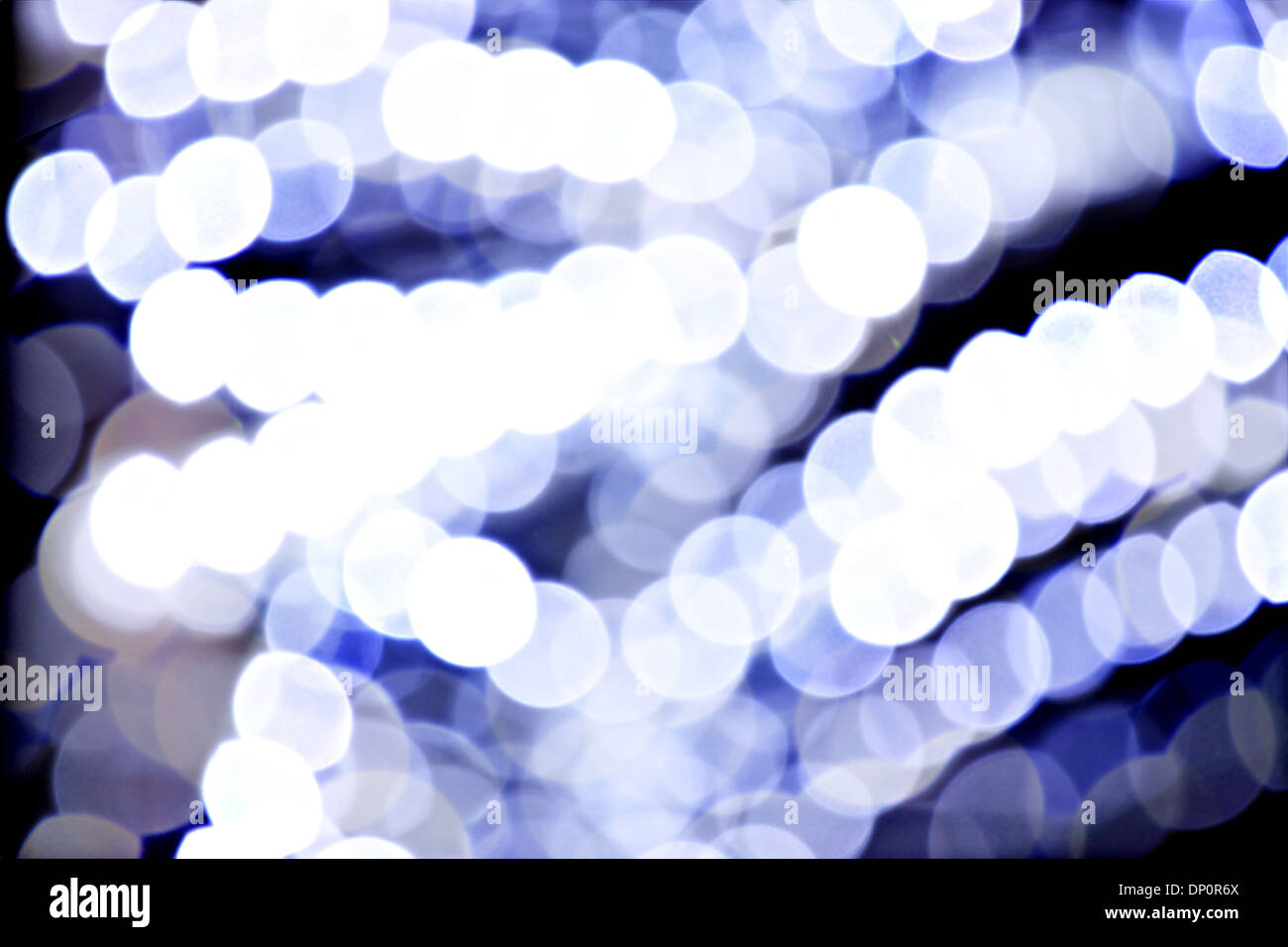 White lights blurry bokeh abstract of background. Stock Photo