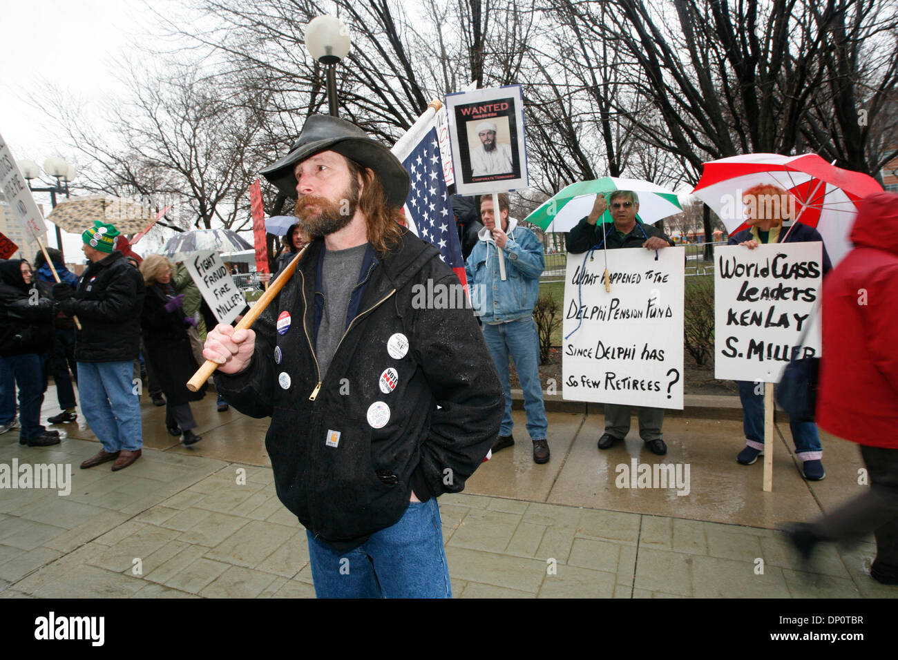 Apr 03, 2006; Detroit, MI, USA; Dennis Deeling, UAW member with 29 years seniority at Delphi East Manufacturing Plant in Flint, Michigan, stood  with others in Detroit. Deeling said he can't retire because he needs to help support a two-year-old grandchild who has cancer. Protesters, including members of Soldiers of Solidarity (SOS), a group of union members opposed to concessions, Stock Photo