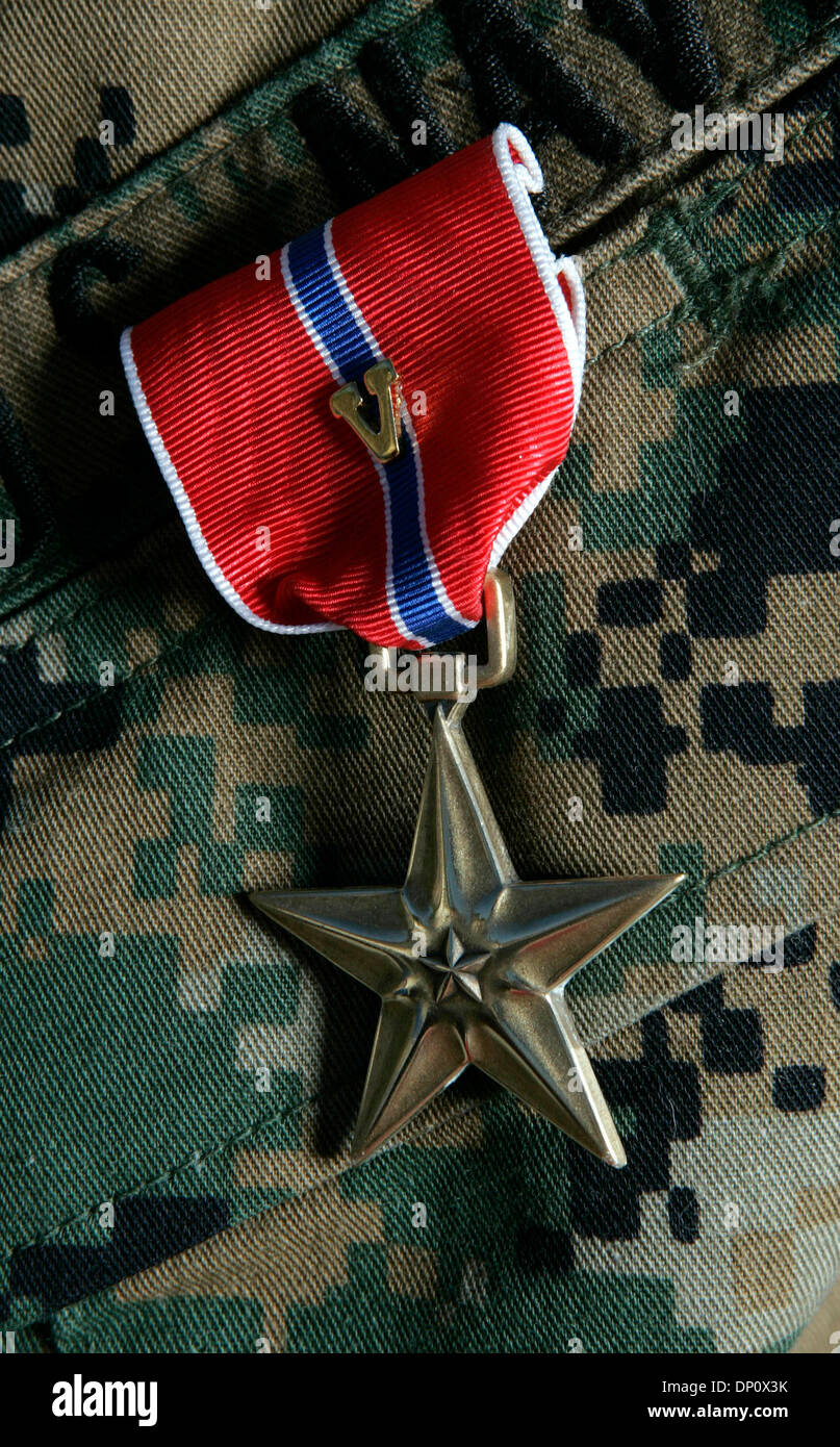 Apr 06, 2006; Camp Pendleton, CA, USA; Petty Officer NATHANIEL R. LEONICIO was the focus of a ceremony at the Naval Hospital Camp Pendleton where he recieved a Bronze Star Medal with Combat. Petty Officer NATHANIEL R. LEONICIO lost his leg while serving as a platoon corpsman for Lima Company  3rd Batallion, 7th Marine Regiment, 2-28 combat team 2nd MArine Division, 2nd expeditionar Stock Photo