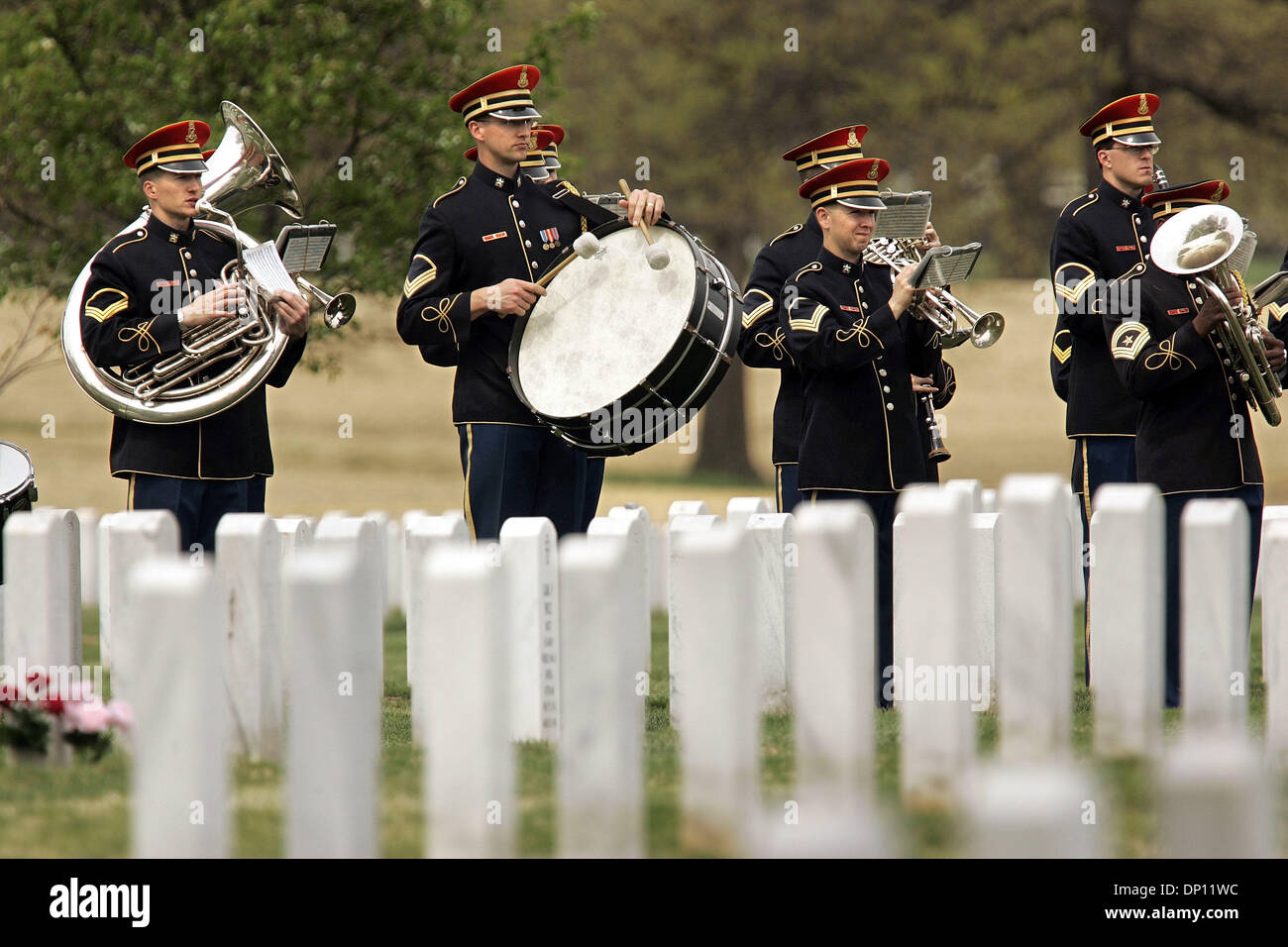 Apr 12, 2006; Washington, DC, USA; A full military band plays in Arlington National Cemetery, during the funeral for Sgt. William E. Dillender April 12, 2006. The Department of Defense POW/Missing Personnel Office announced on February 14, 2006, that the remains of Maj. Jack L. Barker, Waycross, Fa.; Capt. John F. Dugan, Roselle, N.J.; Sgt. William E. Dillender, Naples, Fla.; and P Stock Photo