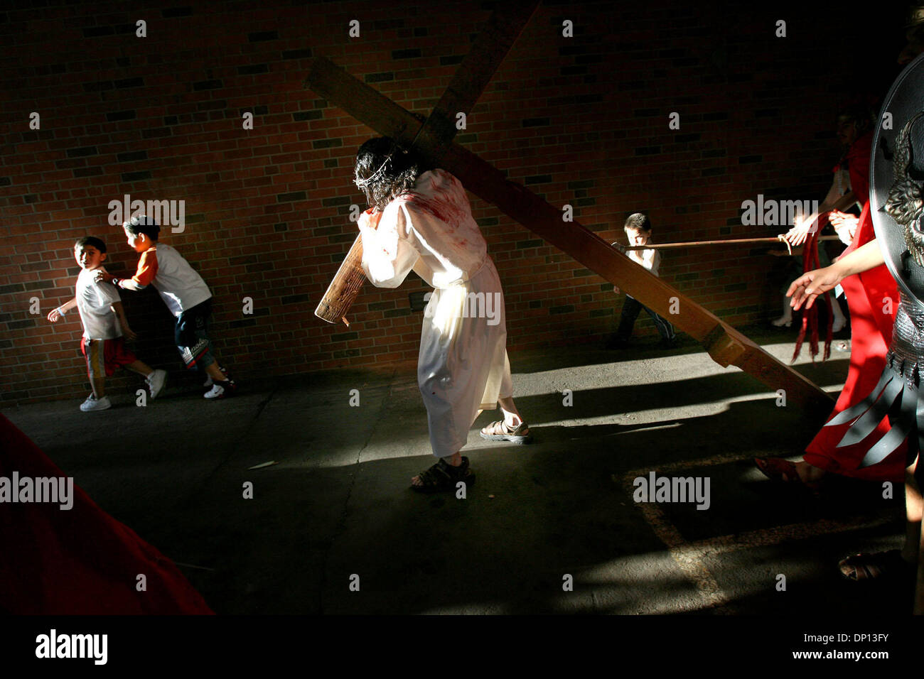Apr 14, 2006; Minneapolis, MN, USA; Taking advantage of warm weather a student group known as Jovenes En Accion (Youth in Action) perform the Passioin of the Christ play outdoors at Incarnation Catholic Church on 38th and Pleasant Streets in Minneapolis. Mandatory Credit: Photo by Elizabeth Flores/ZUMA Press. (©) Copyright 2006 by Minneapolis Star T Stock Photo