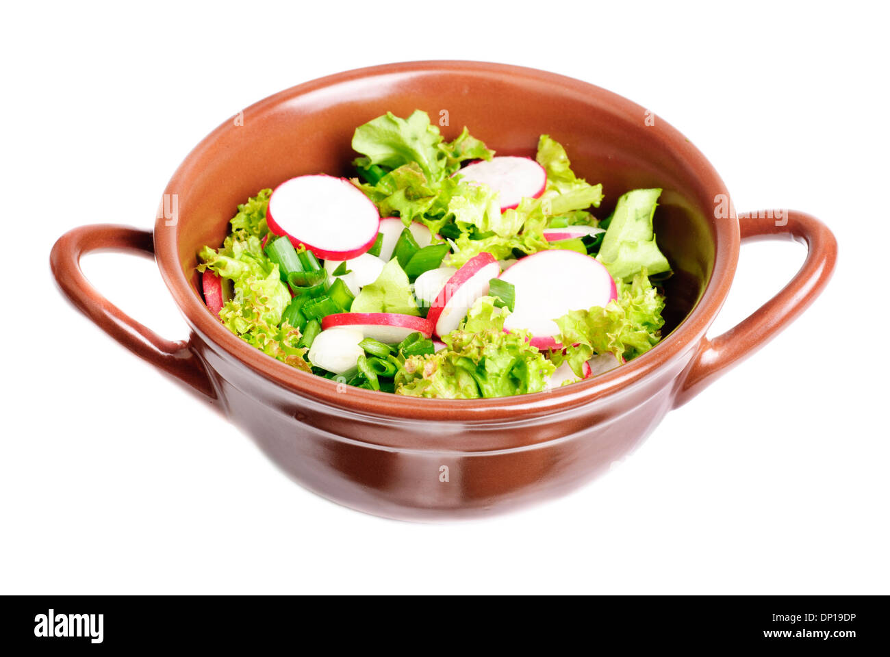 fresh salad with radishes, lettuce and onions on bowl isolated on white Stock Photo