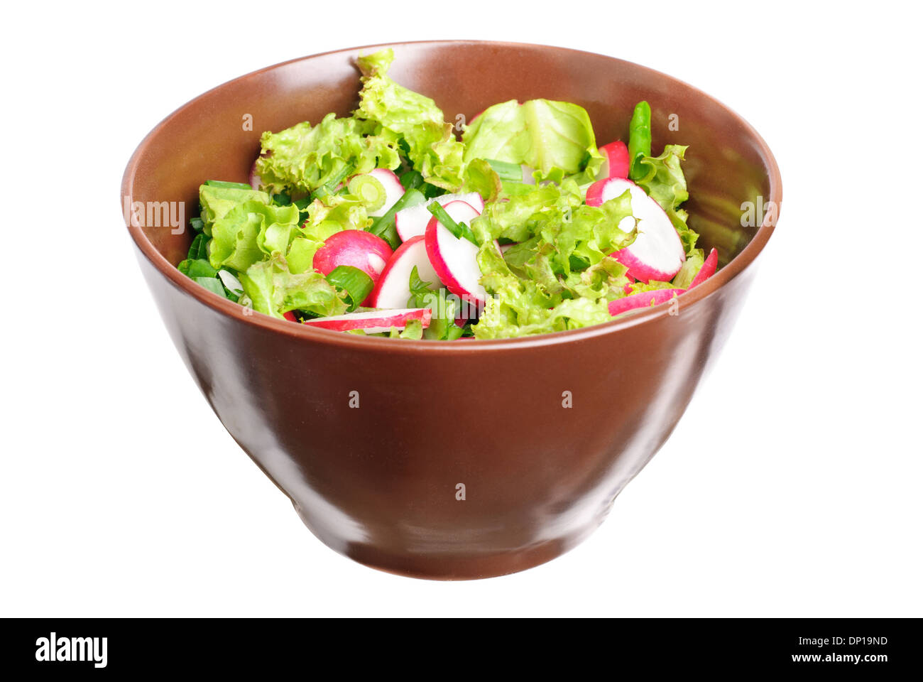 fresh salad with radishes, lettuce and onions on bowl isolated on white  Stock Photo