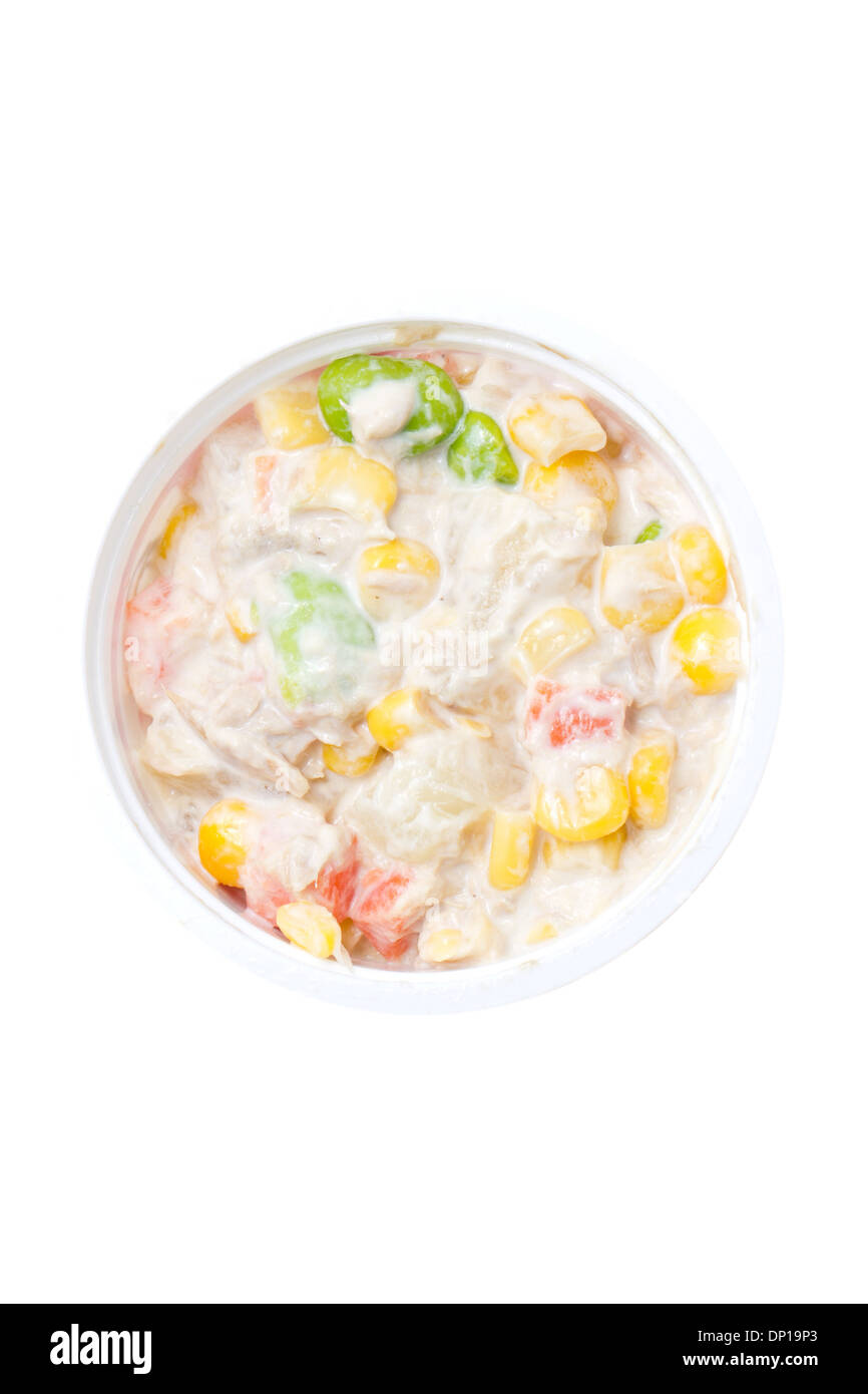 Tuna salad in plastic bowl isolated on white background. Stock Photo