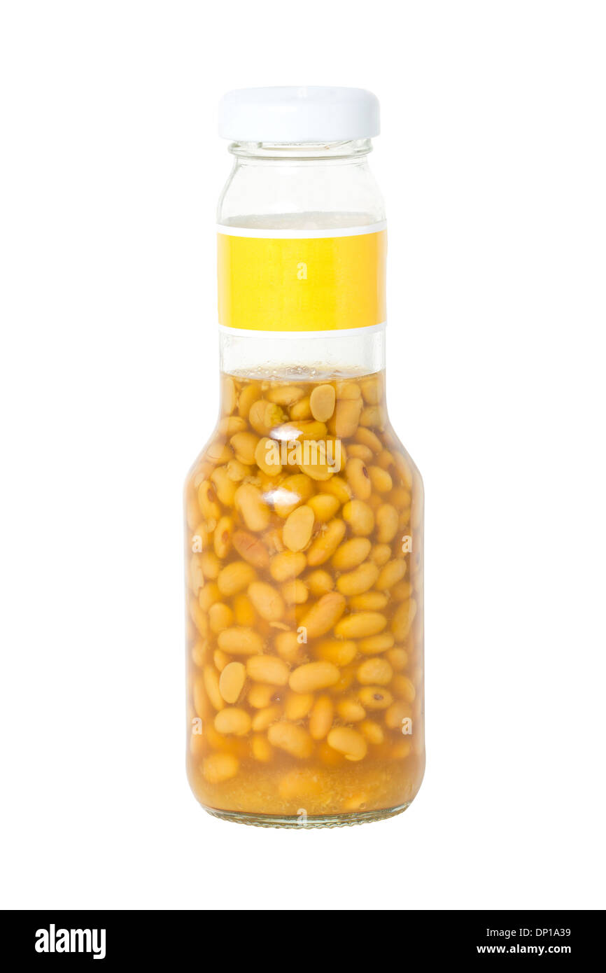 Salted soy bean in glasses bottle isolated on white. Stock Photo