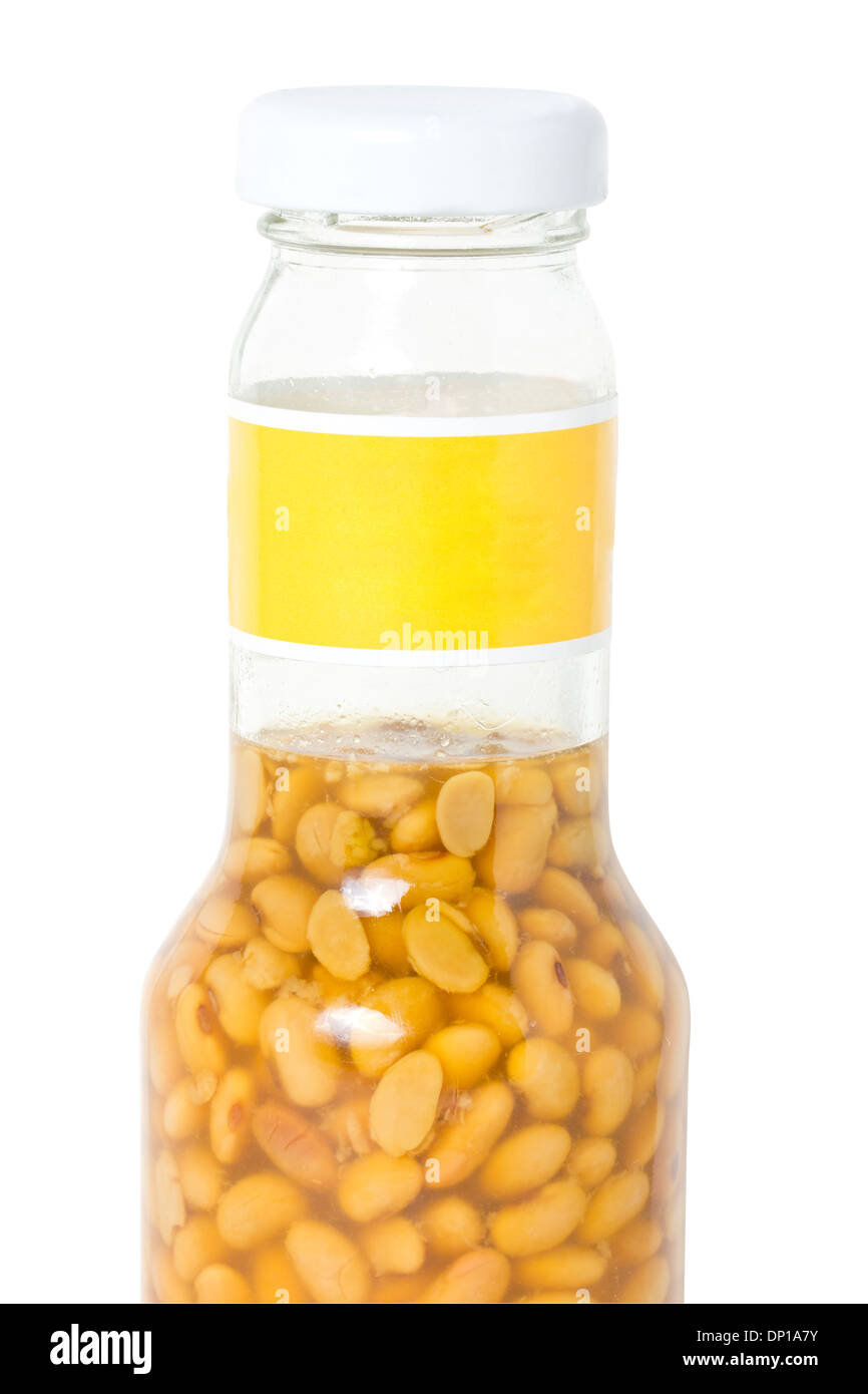 Salted soy bean in glasses bottle isolated on white. Stock Photo