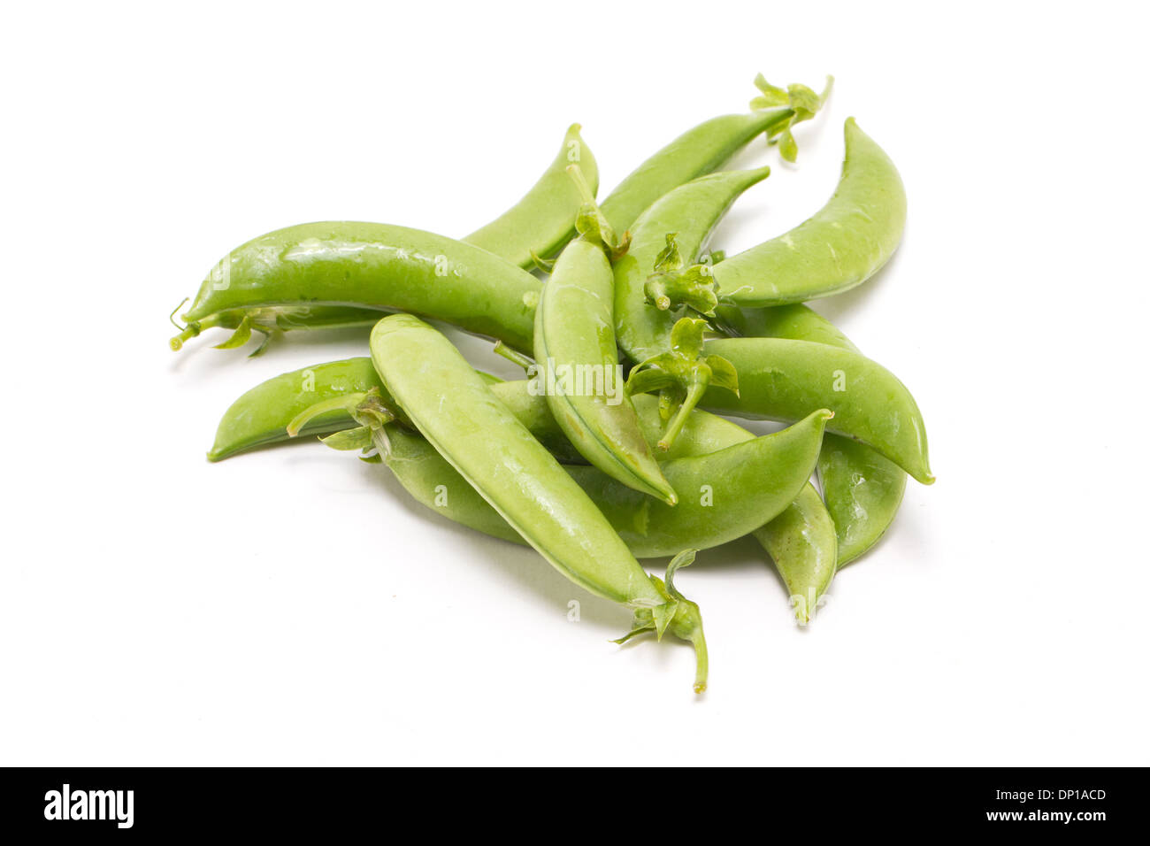 Heap of green peas isolated on white Stock Photo - Alamy