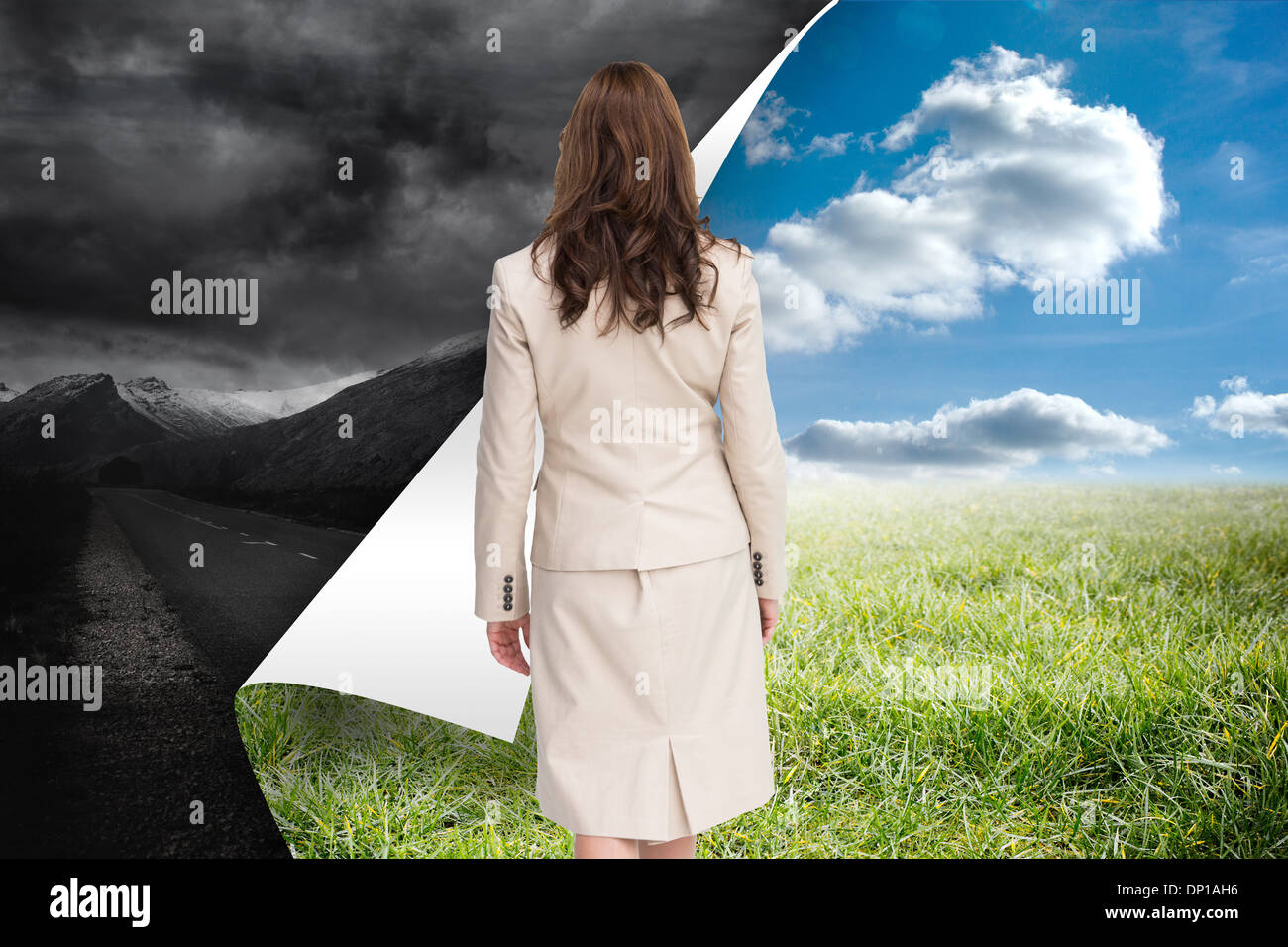 Composite image of classy businesswoman walking away from camera Stock Photo