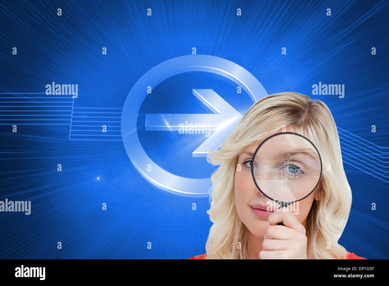 Composite image of fair-haired woman looking through a magnifying glass Stock Photo