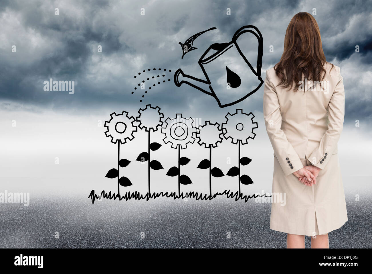 Composite image of rear view of businesswoman Stock Photo - Alamy