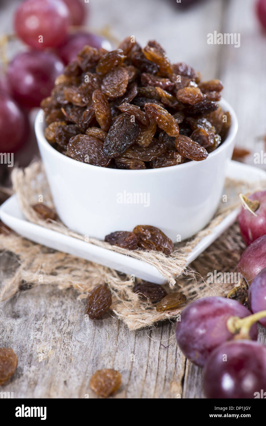Portion of Raisins with some fresh fruits Stock Photo Alamy