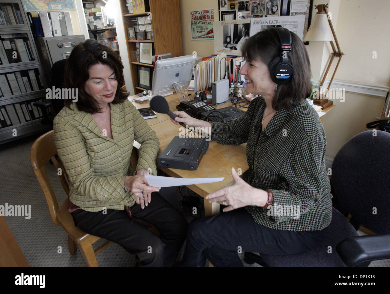 May 03, 2006; San Francisco, CA, USA; Davia Nelson and Nikki Silva, Nikki holds microphone as she records the voice of Davia for The Kitchen Sisters, a Bay Area duo who put together a fantastic radio show for NPR.  Mandatory Credit: Photo by Penni Gladstone/San Francisco Chronicle/ZUMA Press. (©) Copyright 2006 by San Francisco Chronicle Stock Photo