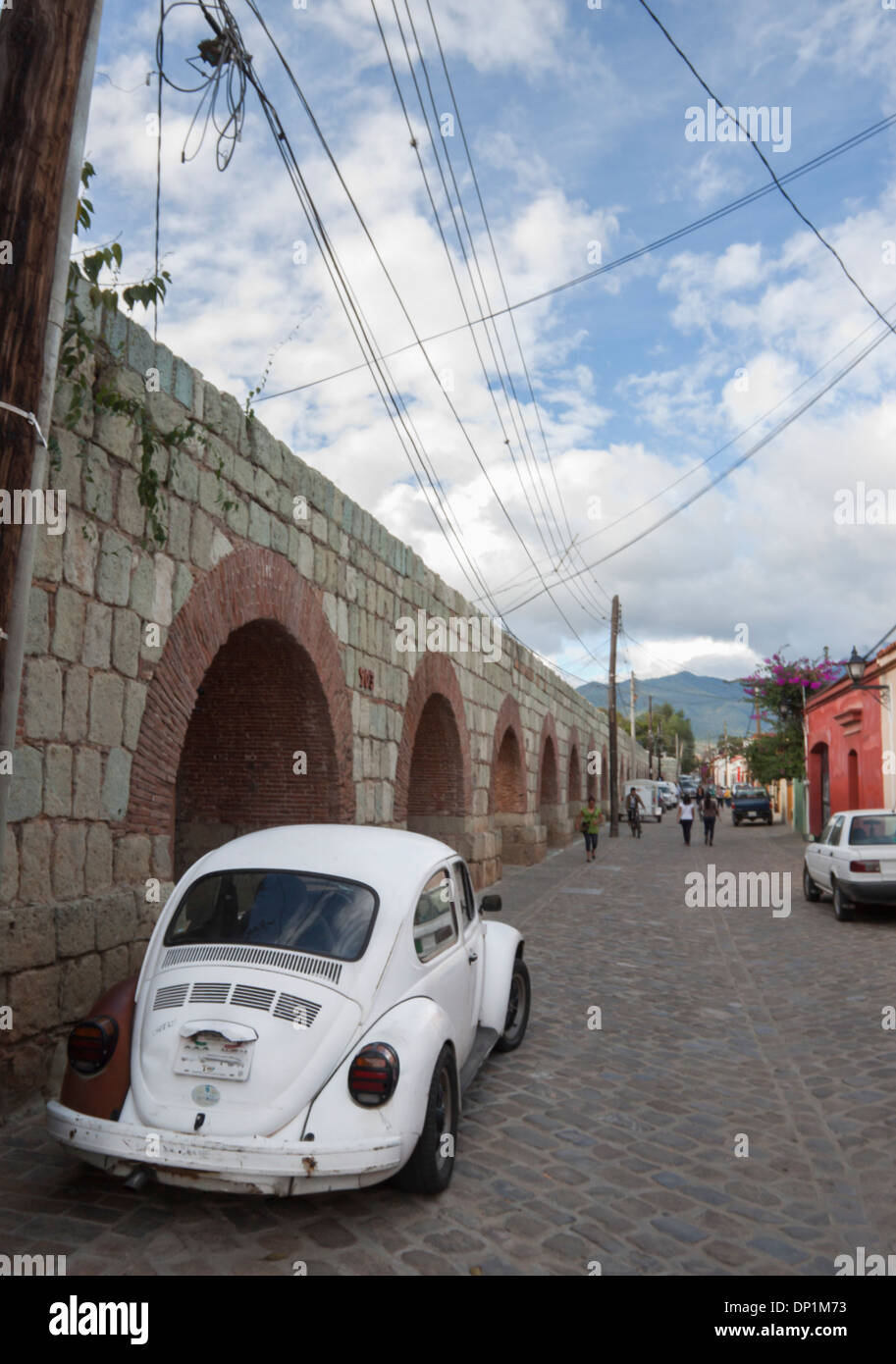 Old white bocho mexican and aqueduct. Oaxaca, Oaxaca. Mexico Stock Photo