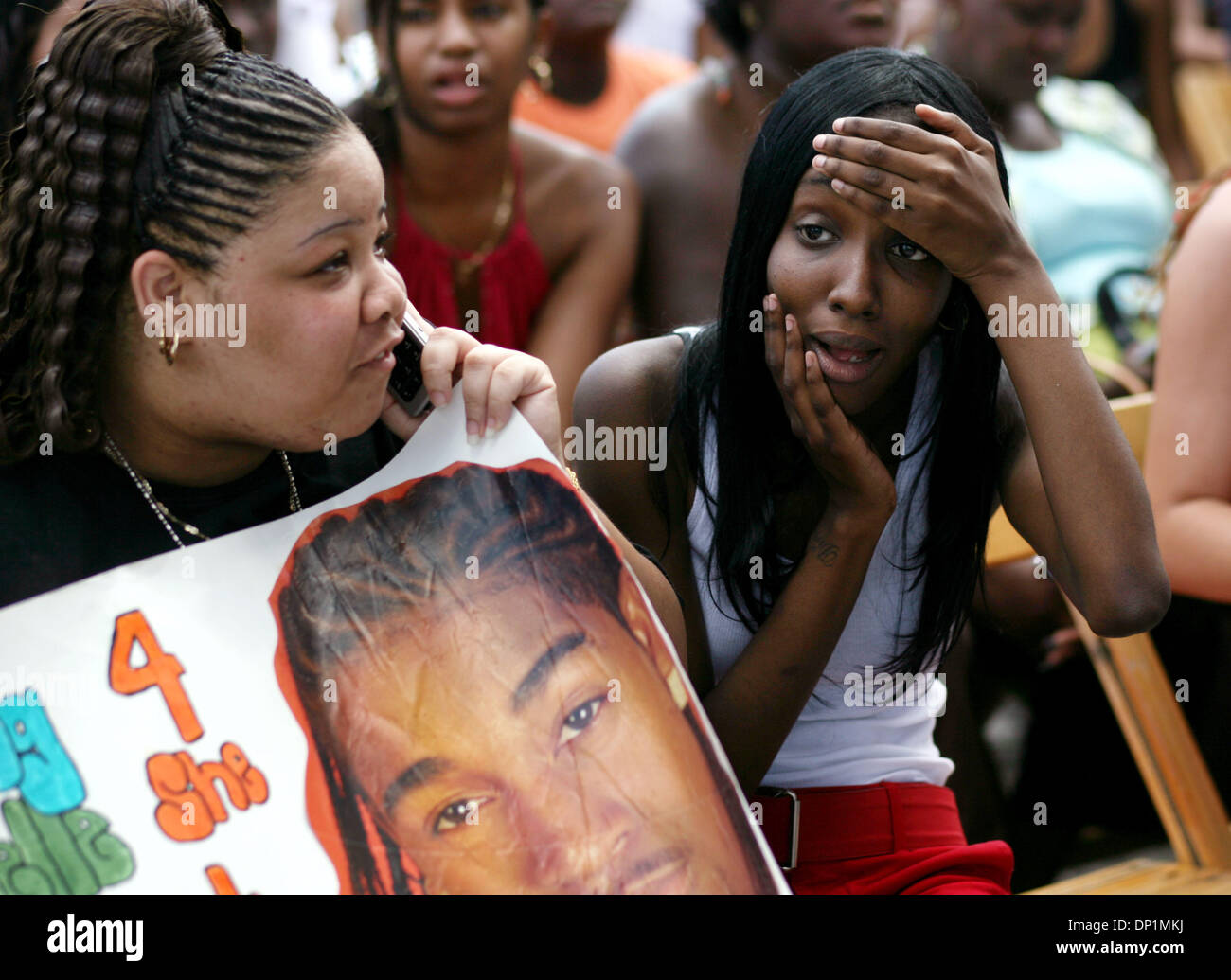 May 06, 2006; West Palm Beach, FL, USA; Shenelle Williams, 21, left, of Margate, and Dina Joseph, 18, rigth, of Pompano Beach, wait for R & B singer Omarion to take the stage at Sunfest in West Palm Beach Saturday. Mandatory Credit: Photo by Gary Coronado/Palm Beach Post/ZUMA Press. (©) Copyright 2006 by Palm Beach Post Stock Photo