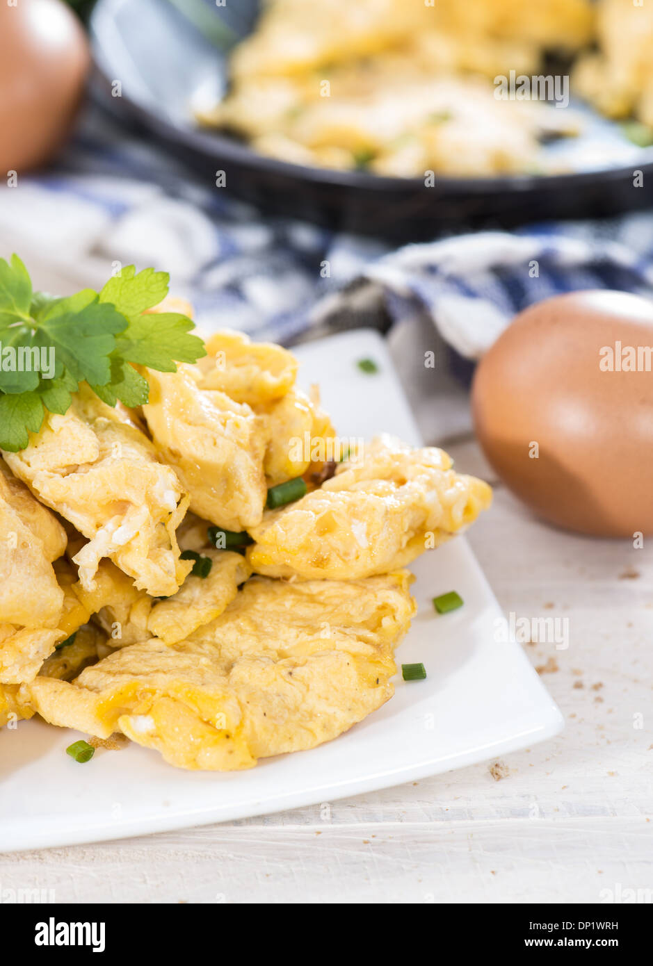 Scrambled Eggs with fresh eggs and herbs Stock Photo - Alamy