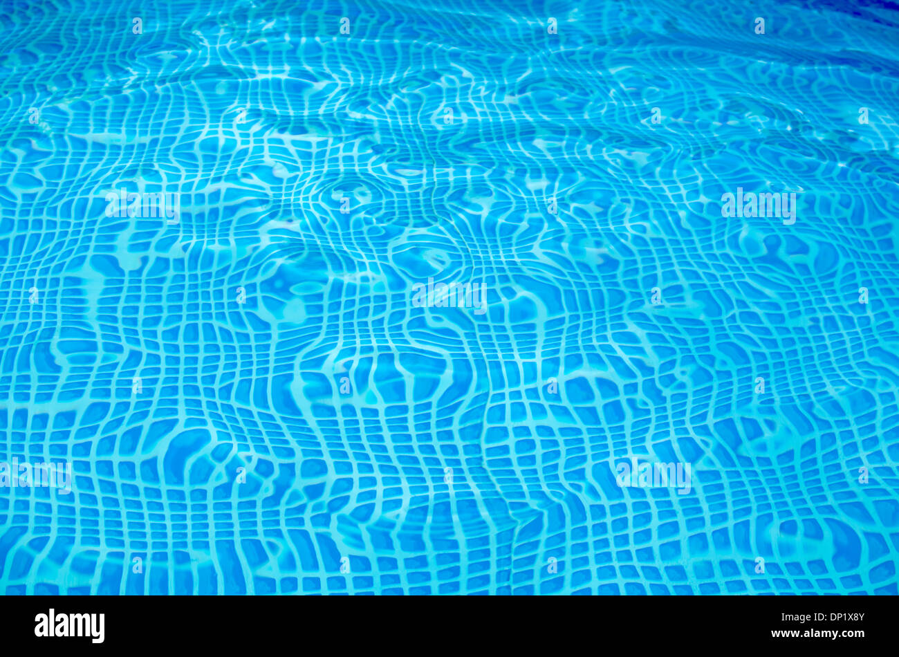 Abstract Blue Checked Bottom of a Wavy Pool 1 Stock Photo